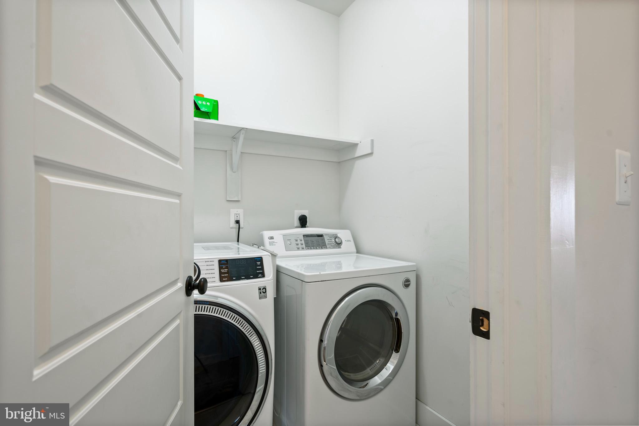 1965 Lowery Road Huntingtown, MD 20639 - Photo 40 of 54 a utility room with dryer and washer