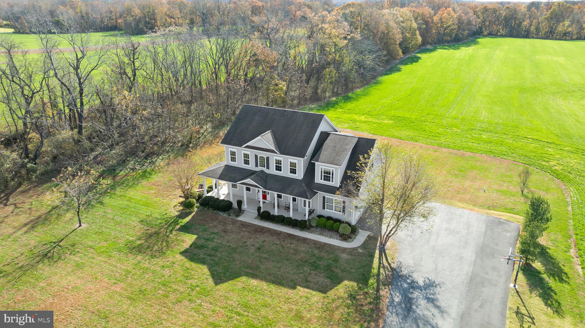 1965 Lowery Road Huntingtown, MD 20639 - Photo 4 of 54 a view of a chairs in a backyard