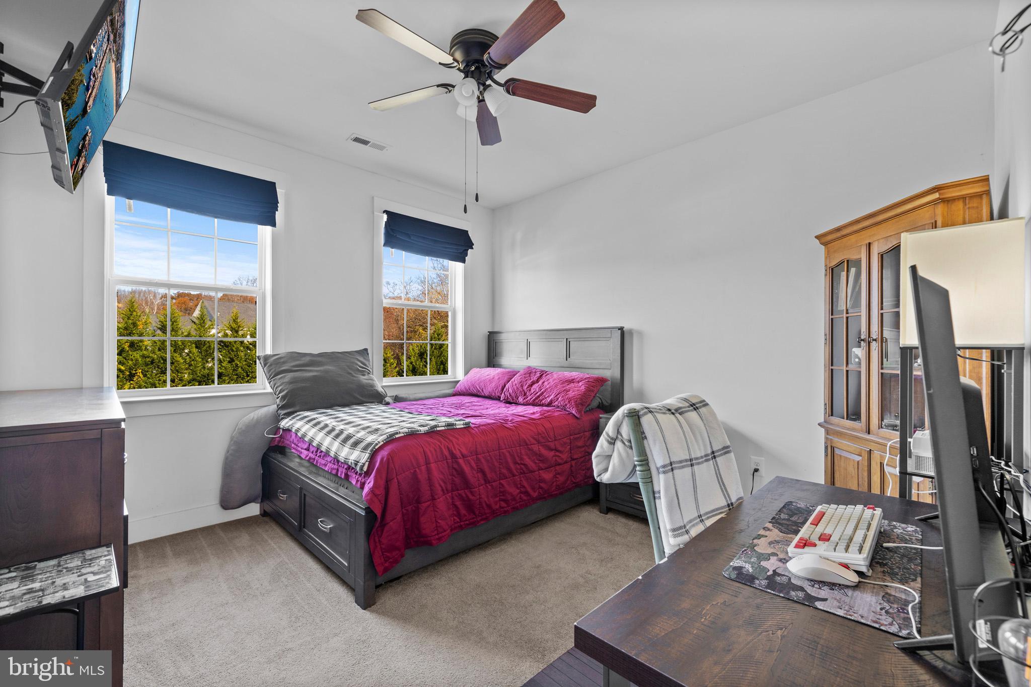 1965 Lowery Road Huntingtown, MD 20639 - Photo 44 of 54 a bedroom with a bed and a window