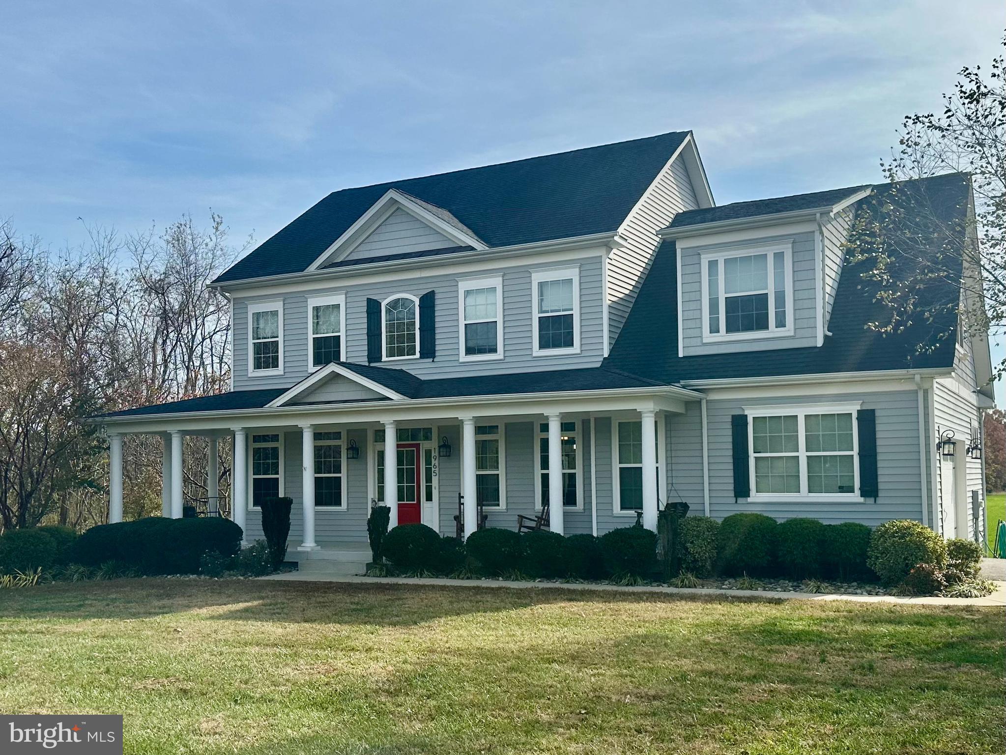 1965 Lowery Road Huntingtown, MD 20639 - Photo 47 of 54 a front view of a house with a yard