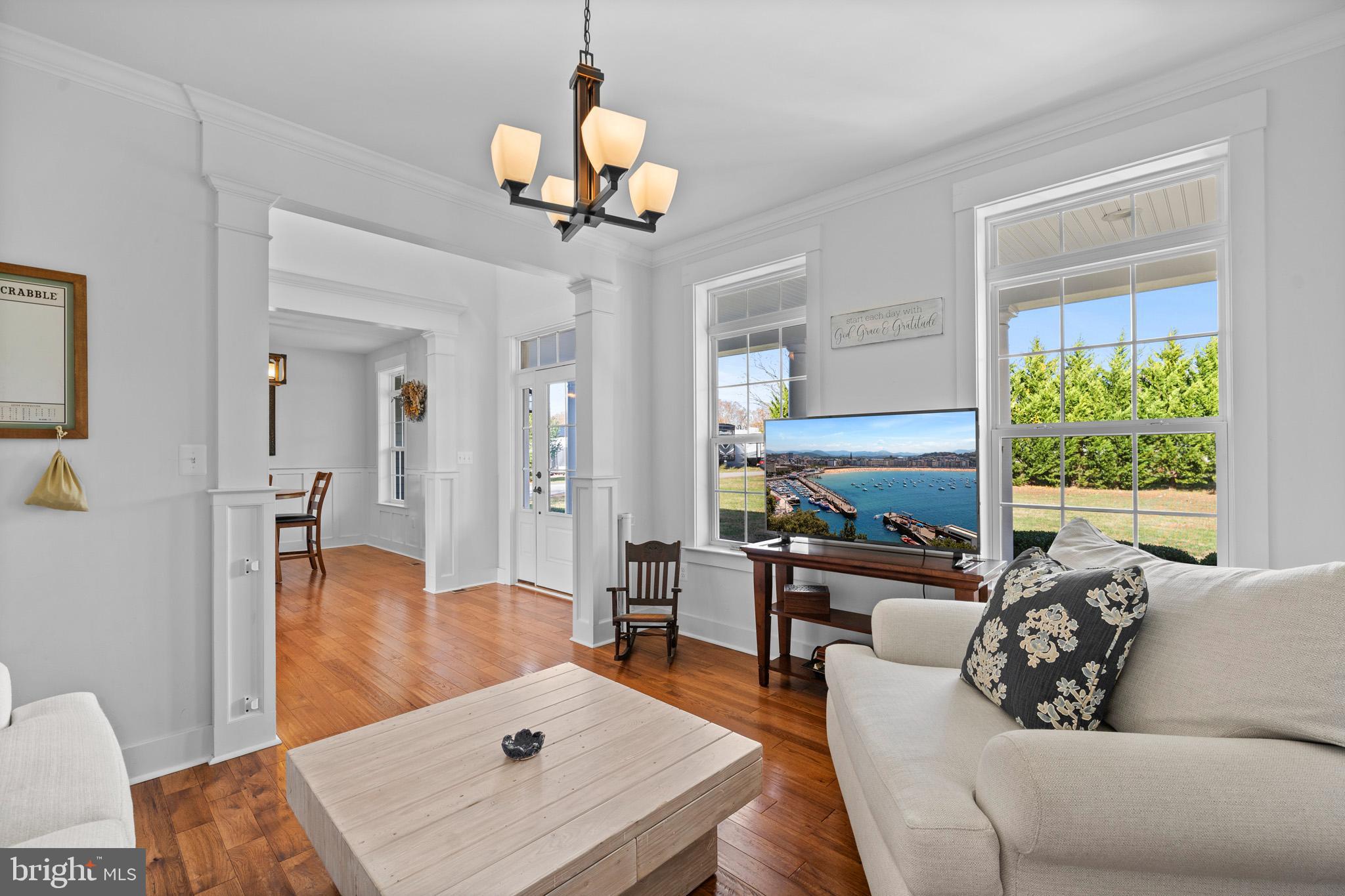 1965 Lowery Road Huntingtown, MD 20639 - Photo 10 of 54 a living room with furniture and a chandelier