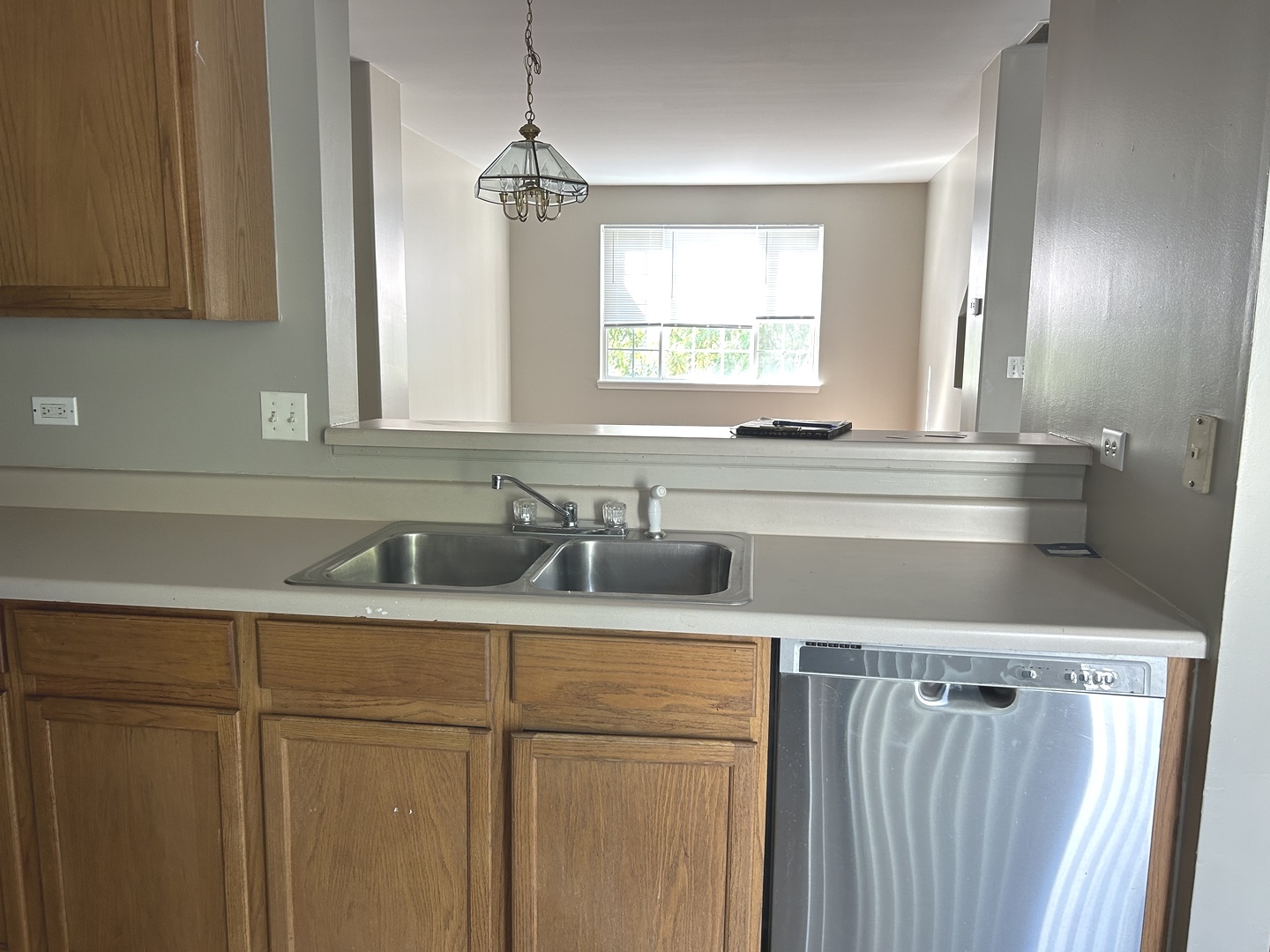 3466 Ravinia Circle, Unit 3466 Aurora, IL 60504 - Photo 9 of 24 a bathroom with a sink and a window