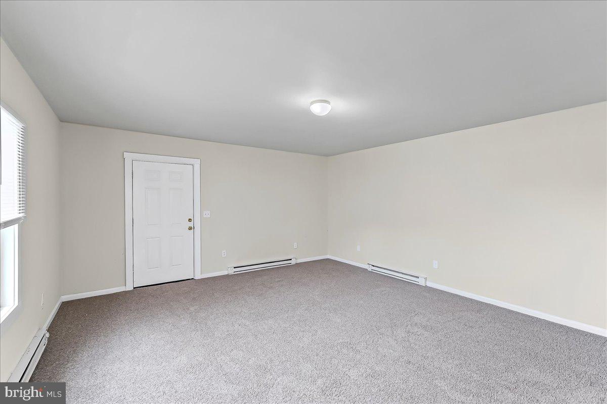 162 West Main Street Elkton, MD 21921 - Photo 14 of 41 an empty room with a natural light