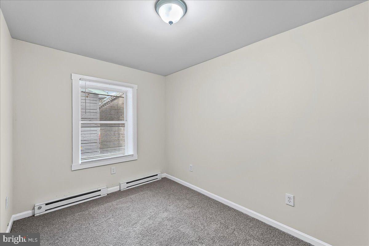 162 West Main Street Elkton, MD 21921 - Photo 15 of 41 an empty room with a window
