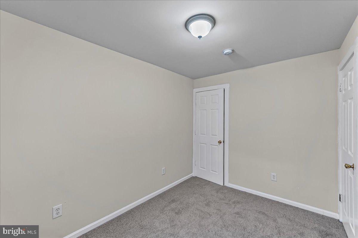 162 West Main Street Elkton, MD 21921 - Photo 16 of 41 an empty room with a empty space and window