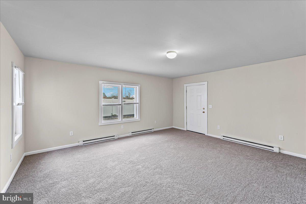 162 West Main Street Elkton, MD 21921 - Photo 17 of 41 a view of an empty room with a window