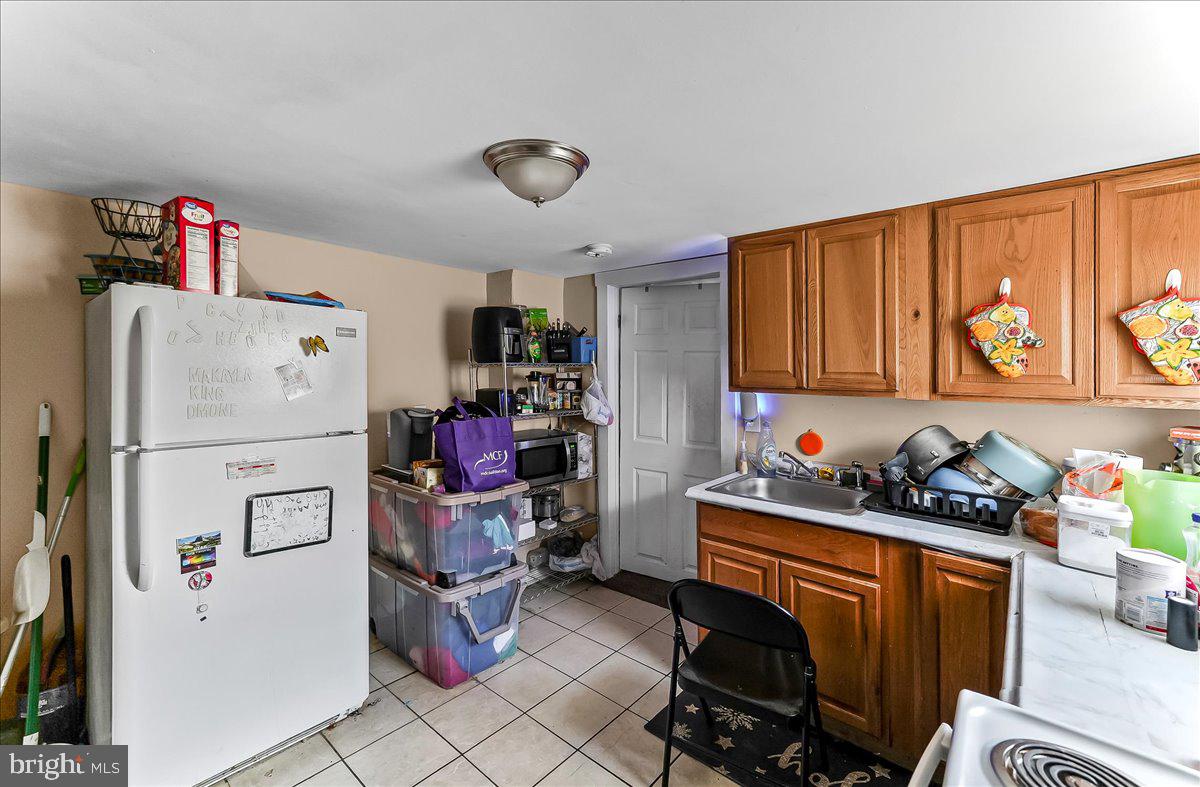 162 West Main Street Elkton, MD 21921 - Photo 25 of 41 a room with storage and utility