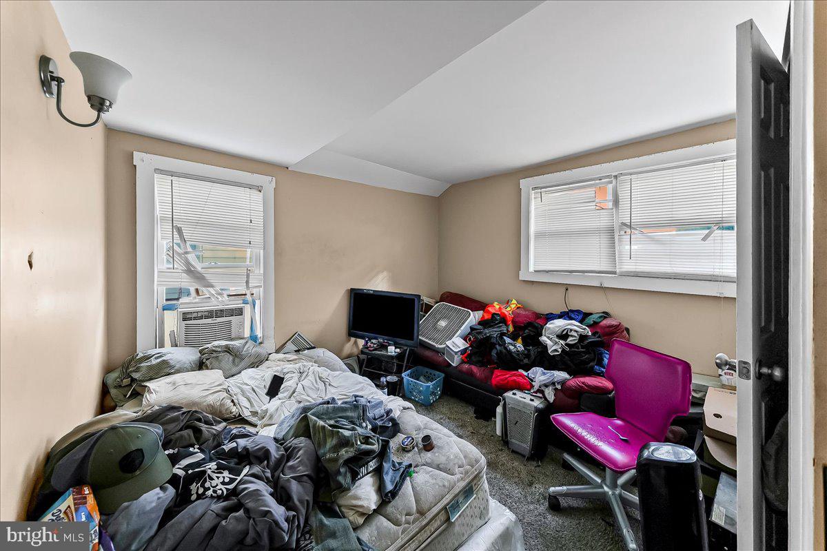 162 West Main Street Elkton, MD 21921 - Photo 29 of 41 a bedroom with a bed and a window