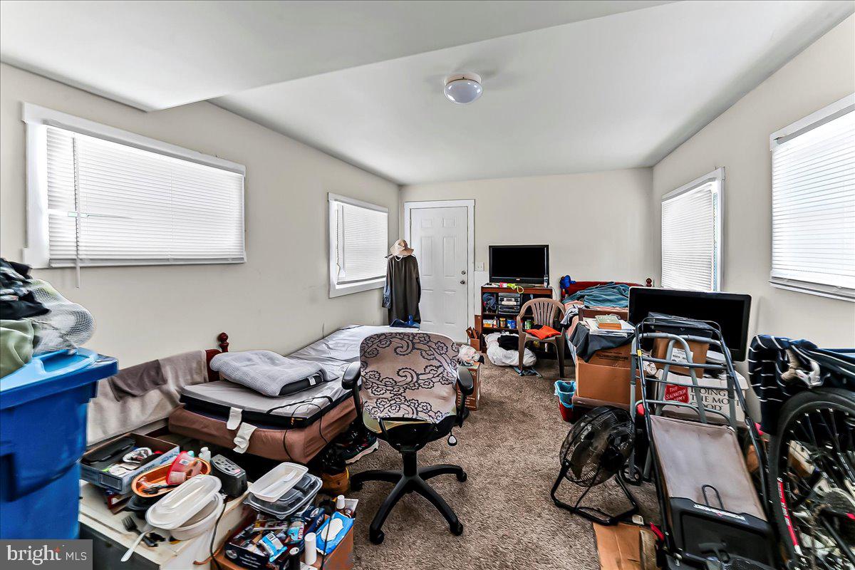 162 West Main Street Elkton, MD 21921 - Photo 31 of 41 a living room with furniture a flat screen tv and a window