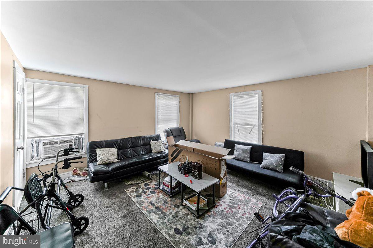 162 West Main Street Elkton, MD 21921 - Photo 34 of 41 a living room with furniture and a couch