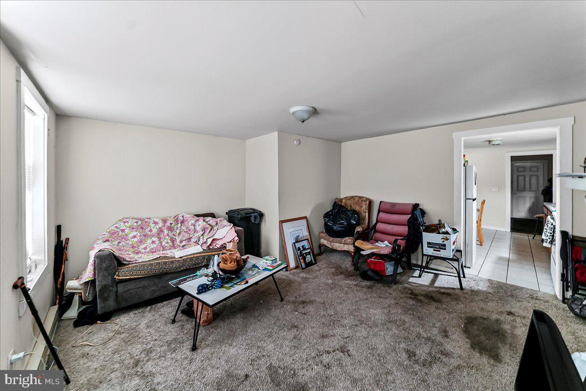 162 West Main Street Elkton, MD 21921 - Photo 10 of 41 a living room with furniture a couch and a window