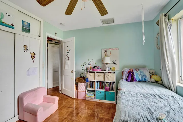 a kitchen with a refrigerator and sink