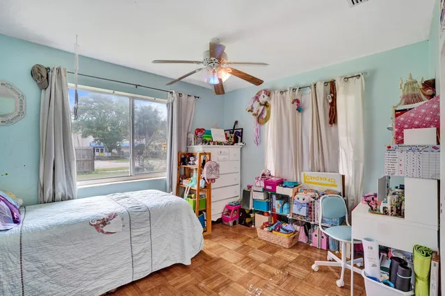 a room with furniture and flat screen tv