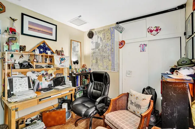 a view of a house with a yard and plants