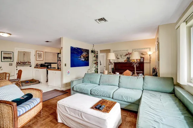 a living room with furniture and a couch