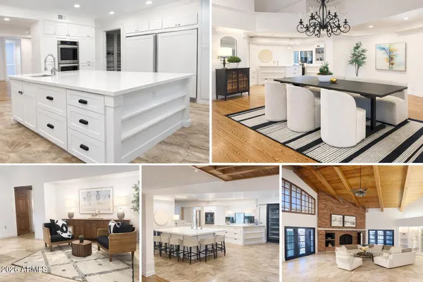 a large kitchen with stainless steel appliances kitchen island granite countertop a large counter top and cabinets