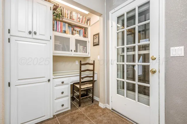 a view of an entryway with a door