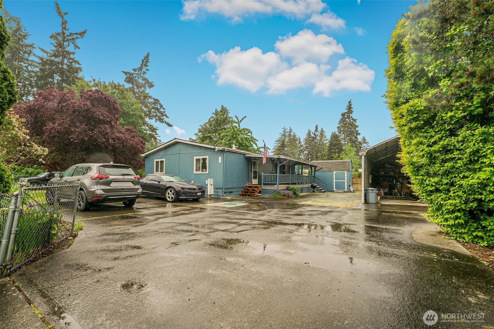 980 South Falcon Road Camano Island, WA 98282 - Photo 2 of 30 a view of a car park in front of house