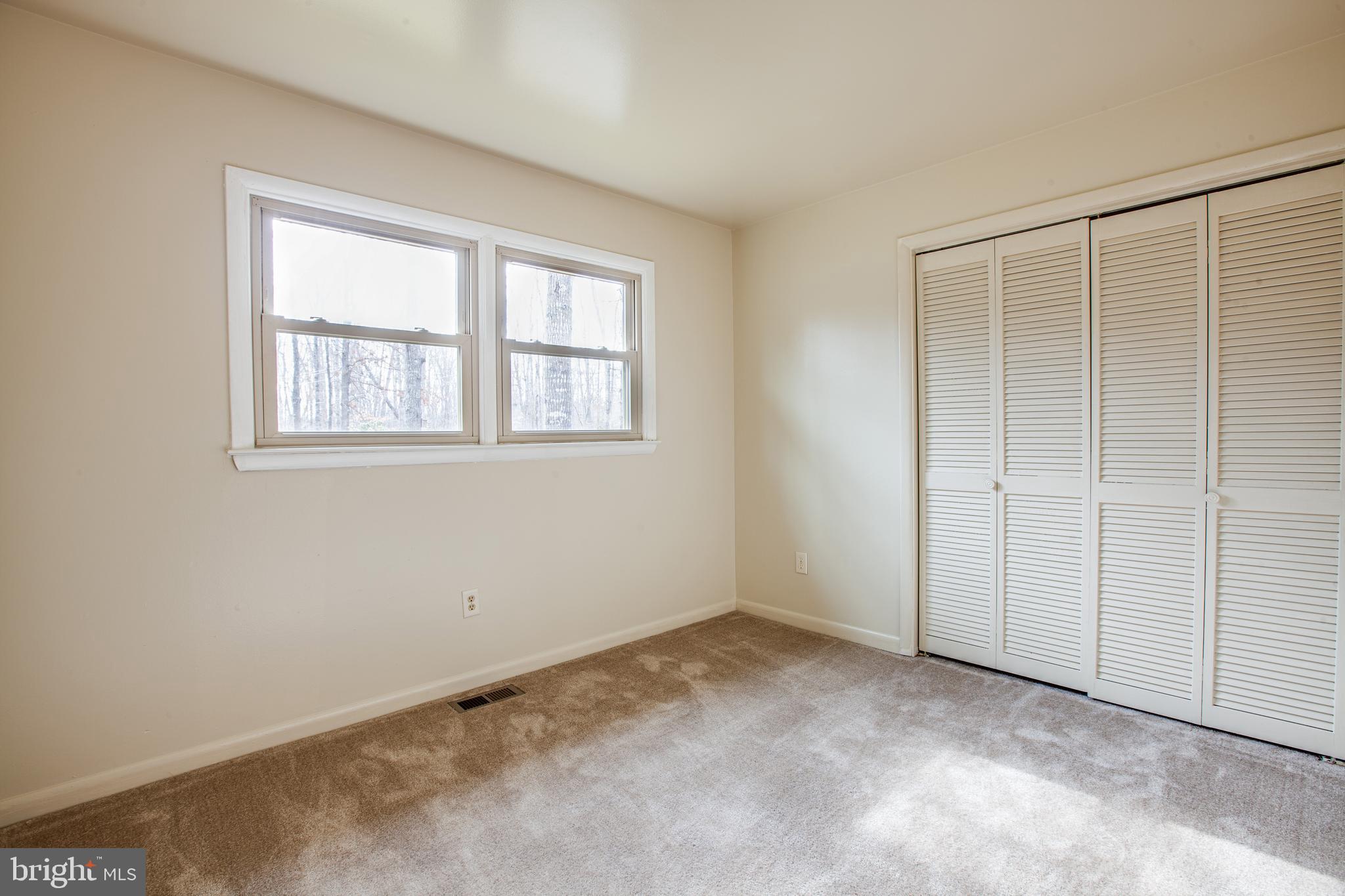 183 Heflin Road Stafford, VA 22556 - Photo 15 of 30 Bedroom three with louvered bi-fold closet doors