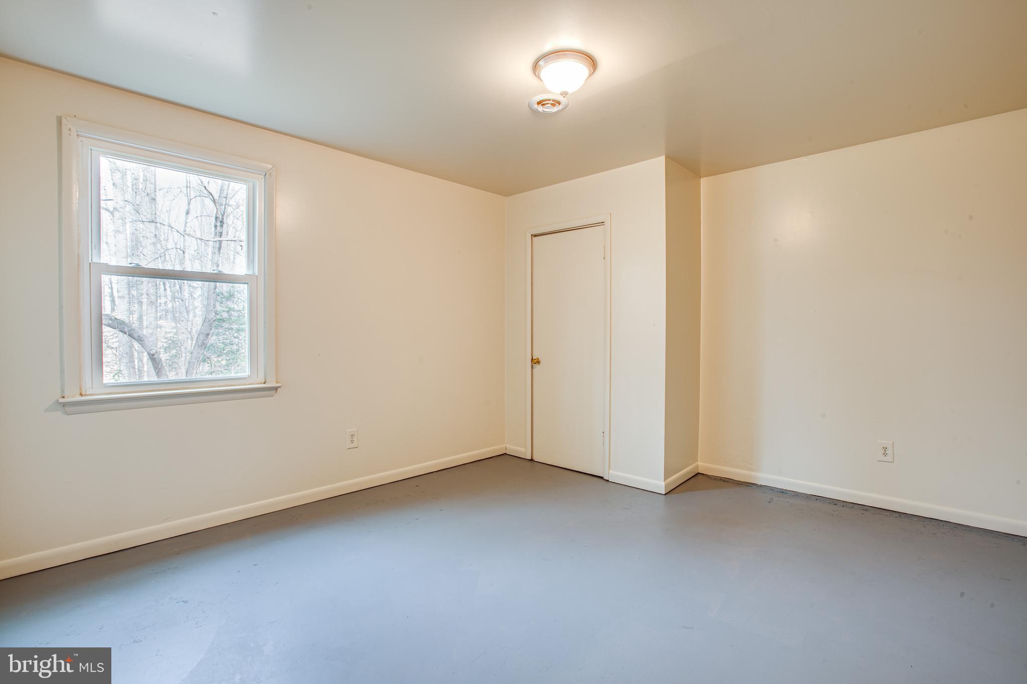 183 Heflin Road Stafford, VA 22556 - Photo 24 of 30 Second room in basement with daylight.