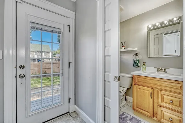 a bathroom with a sink a mirror and a shower