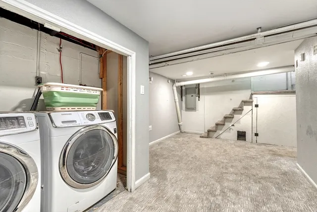 a view of a storage & utility room with washer and dryer