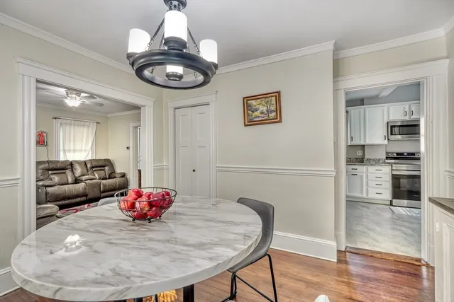 a view of a dining room with furniture