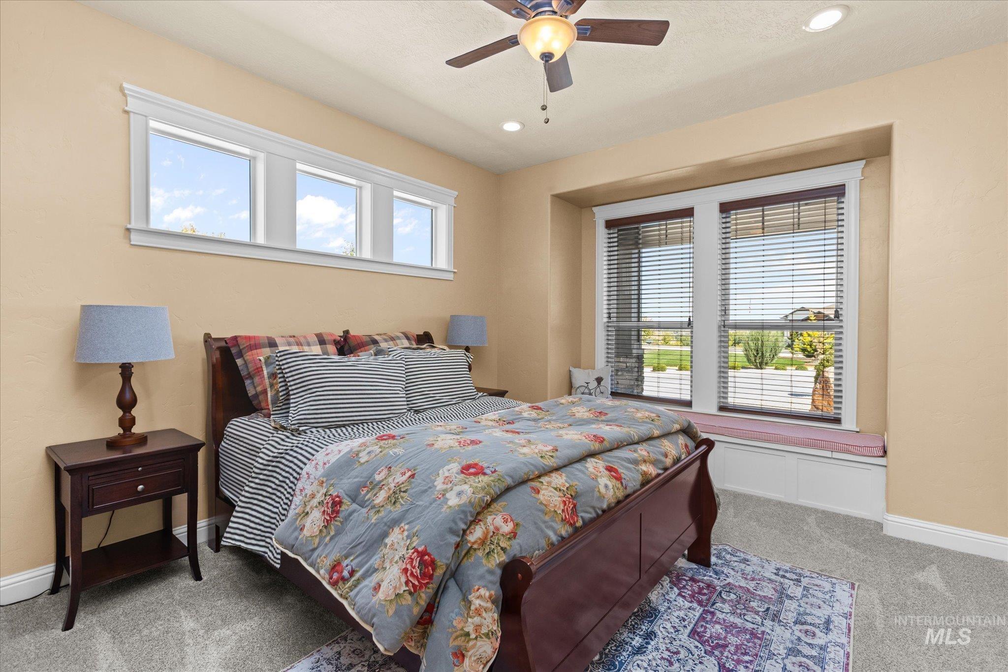 13683 Hockberger Ranch Road Caldwell, ID 83607 - Photo 26 of 50 Recessed window seat with integrated storage, wood-finish ceiling fan with integrated lighting, and recessed ceiling lights
