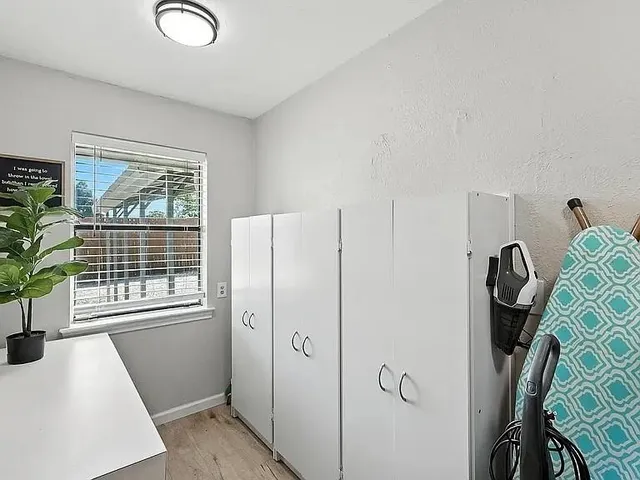 a view of livingroom with furniture and window