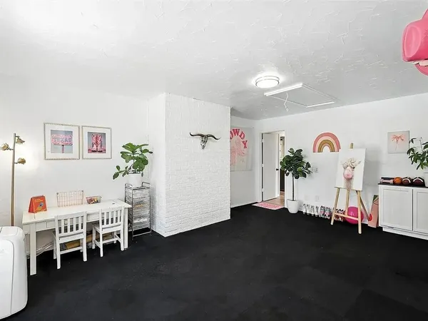 a living room with furniture and a table