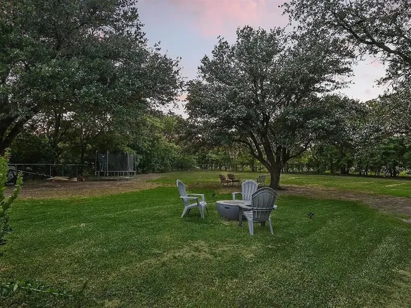 a view of a livingroom with furniture and window