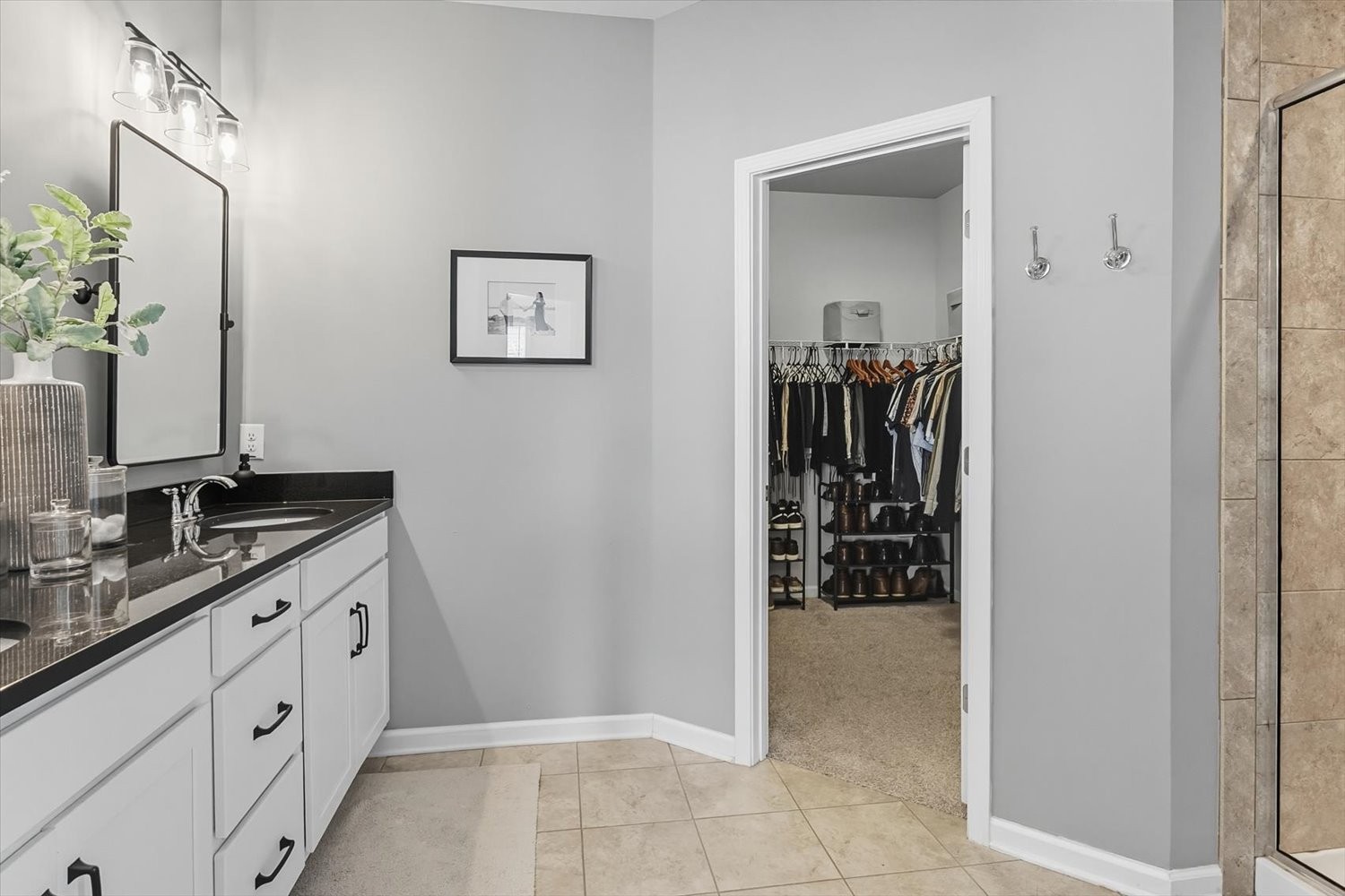 4706 Venito Street Mount Juliet, TN 37122 - Photo 15 of 39 a bathroom with a double vanity sink and a mirror