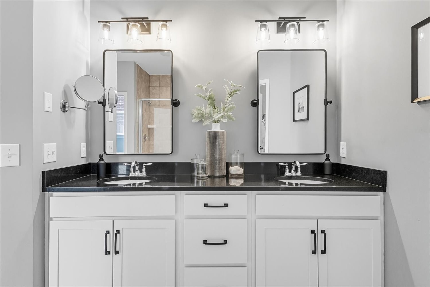 4706 Venito Street Mount Juliet, TN 37122 - Photo 16 of 39 a bathroom with double vanity sinks and a mirror