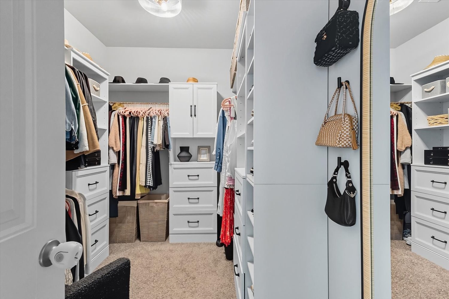 4706 Venito Street Mount Juliet, TN 37122 - Photo 19 of 39 a view of walk in closet with clothes and shoes