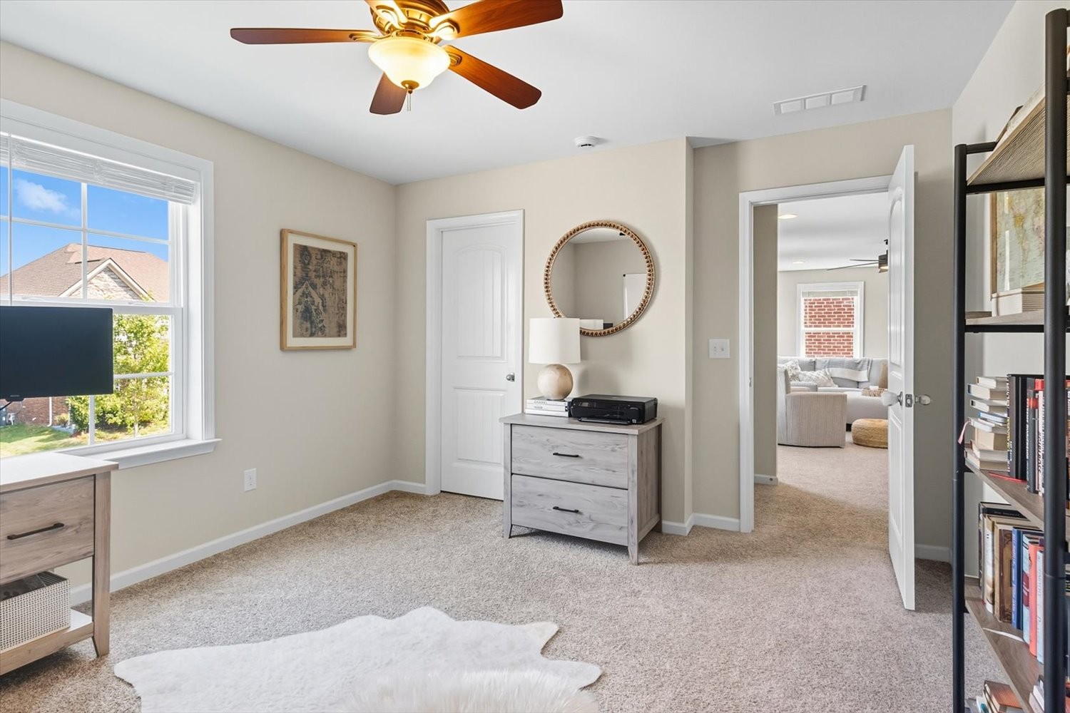 4706 Venito Street Mount Juliet, TN 37122 - Photo 26 of 39 a living room with furniture and a window