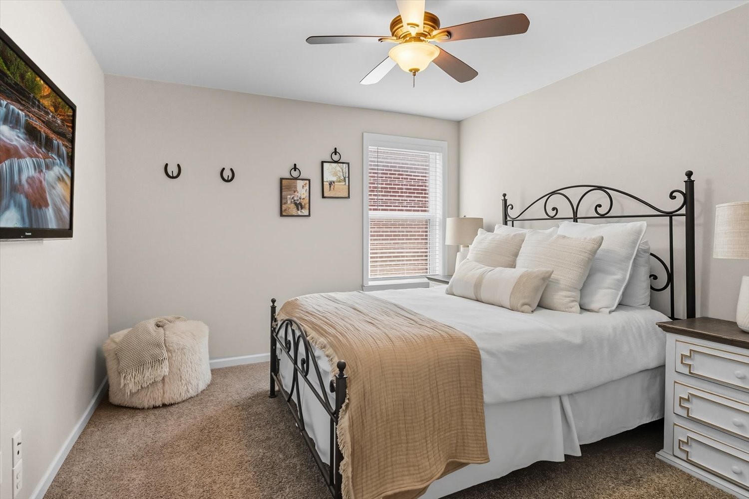4706 Venito Street Mount Juliet, TN 37122 - Photo 30 of 39 a bedroom with a bed and ceiling fan
