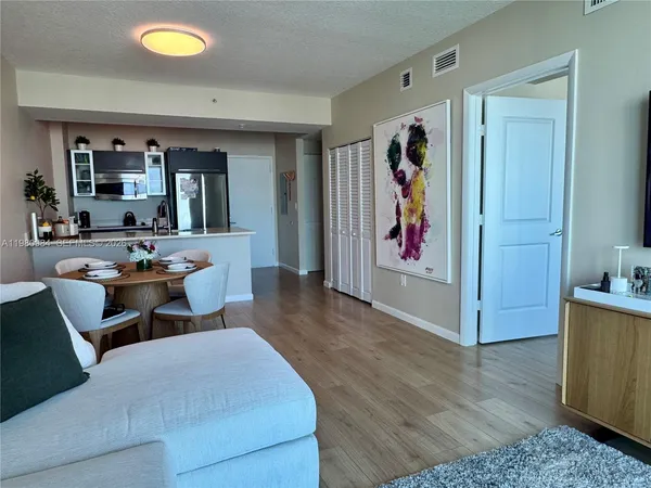 a living room with furniture and window
