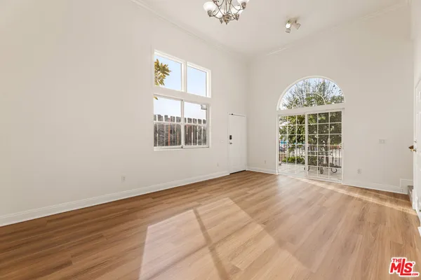 a view of entryway with wooden floor