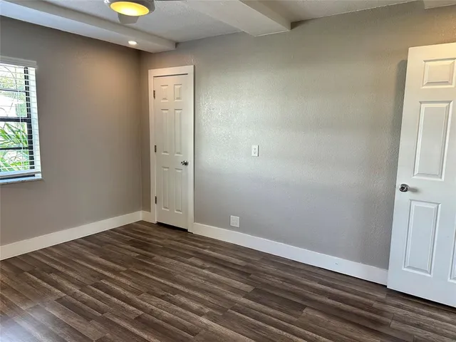 a view of an empty room and window