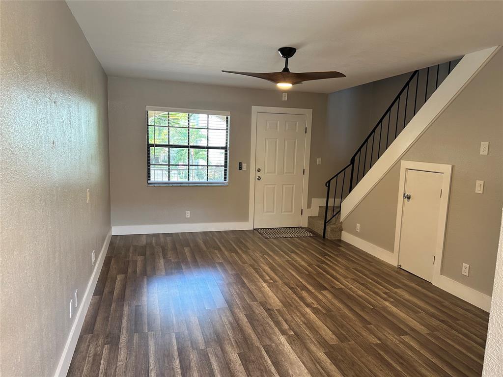 620 Northeast 28th Street, Unit 207 Wilton Manors, FL 33334 - Photo 3 of 30 wooden floor in an empty room with a window