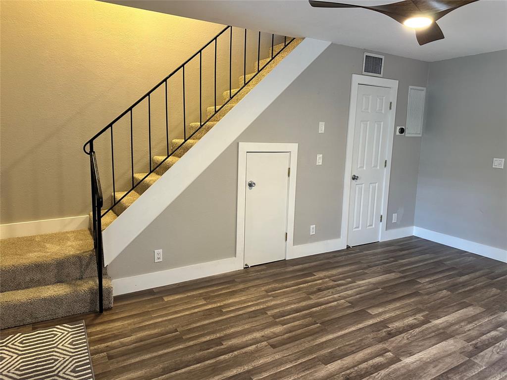 620 Northeast 28th Street, Unit 207 Wilton Manors, FL 33334 - Photo 5 of 30 a view of an entryway with wooden floor