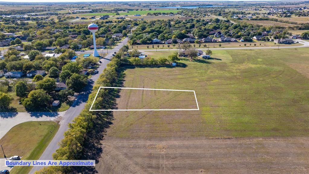 Lot 3-tbd Th Street Muenster, TX 76252 - Photo 3 of 6 an aerial view of a house with a lake view