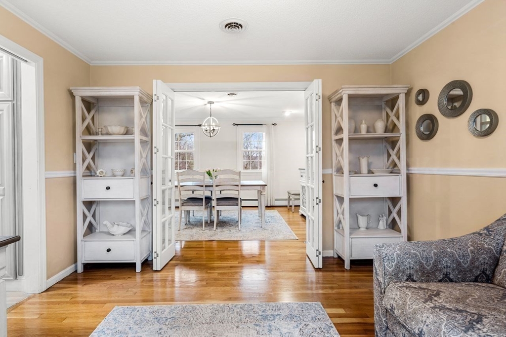 6 Ridge Hill Way Andover, MA 01810 - Photo 11 of 42 a living room with furniture and wooden floor