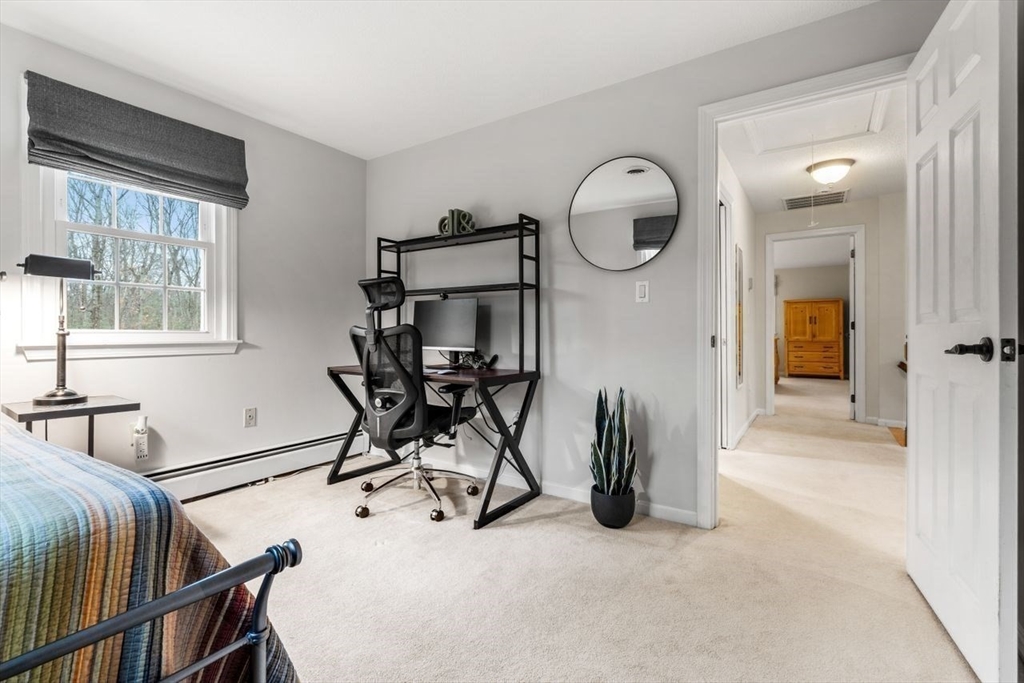 6 Ridge Hill Way Andover, MA 01810 - Photo 20 of 42 a view of a livingroom with furniture and windows