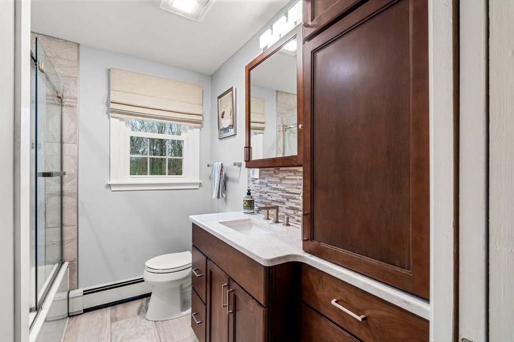 6 Ridge Hill Way Andover, MA 01810 - Photo 25 of 42 a bathroom with a sink a toilet and shower