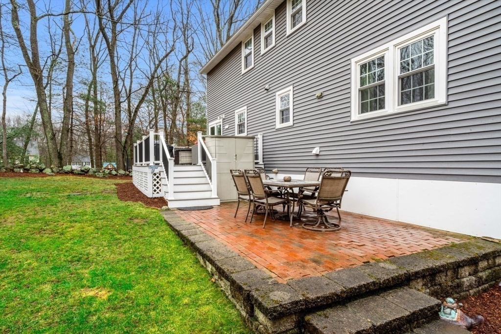 6 Ridge Hill Way Andover, MA 01810 - Photo 32 of 42 a view of a backyard with sitting area