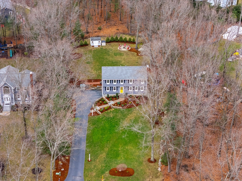 6 Ridge Hill Way Andover, MA 01810 - Photo 36 of 42 a view of a back yard of the house