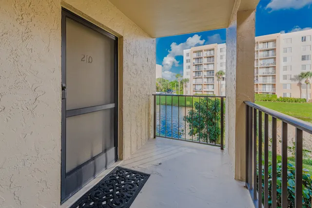 a view of a balcony with an outdoor space