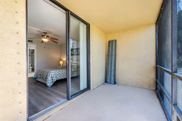a view of a bedroom with bathroom
