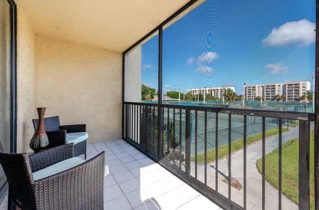 a view of a lake with building in front of it
